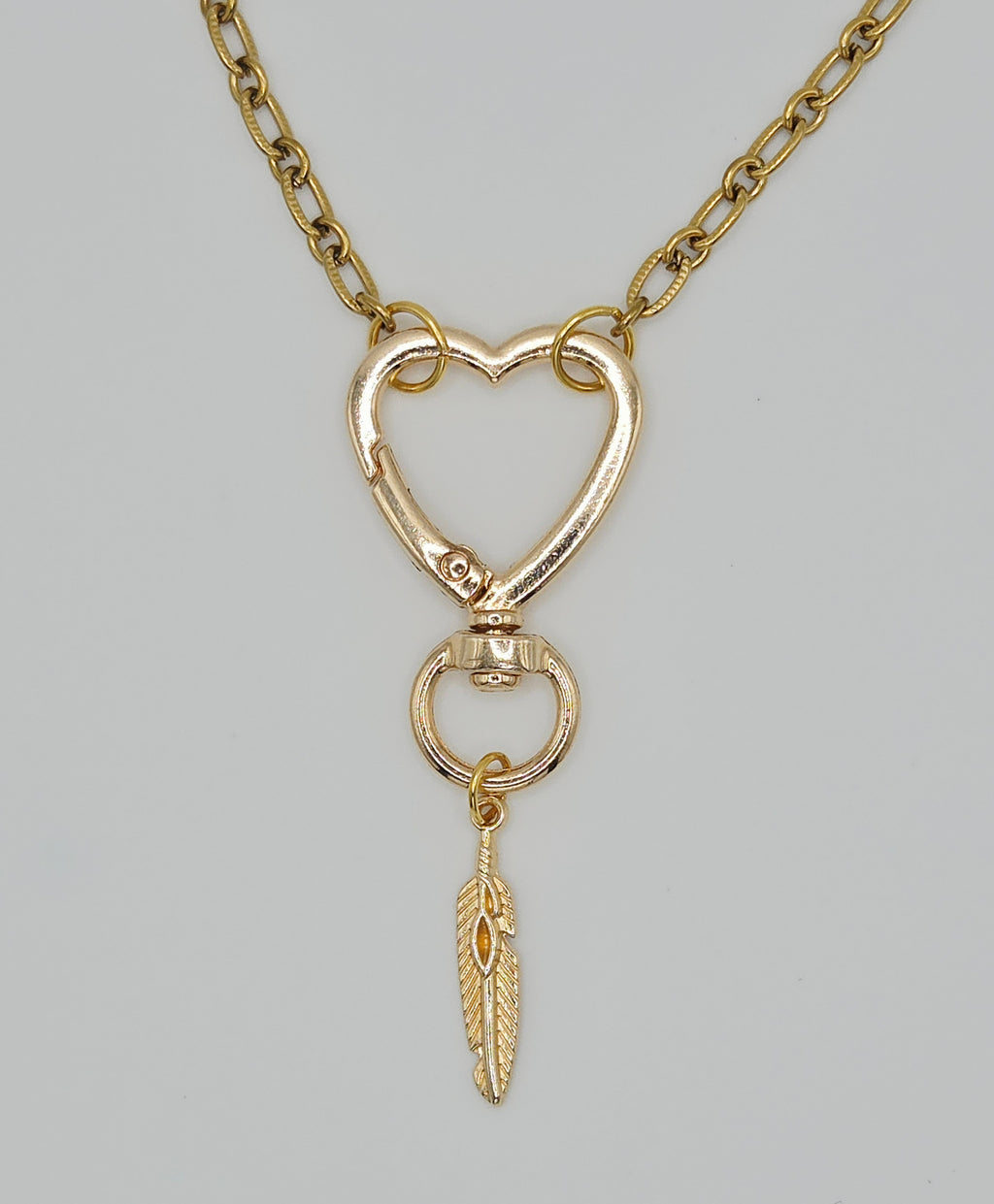 One-of-a-Kind Gold Tone Heart Clasp & Feather Charm Pendant Necklace (18") – Olivia Sparkles Fall 2026 Collection