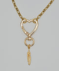 One-of-a-Kind Gold Tone Heart Clasp & Feather Charm Pendant Necklace (18") – Olivia Sparkles Fall 2026 Collection