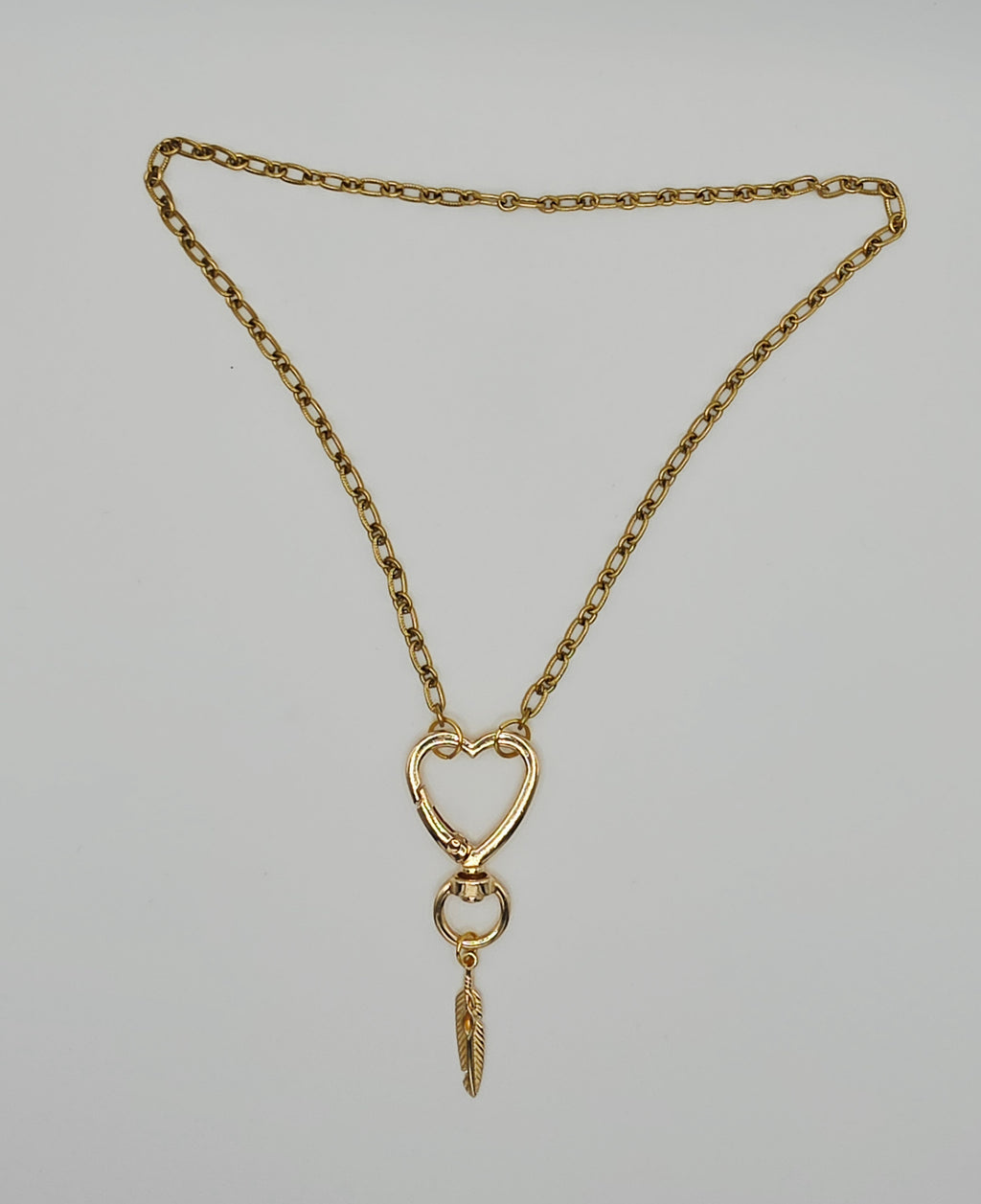 One-of-a-Kind Gold Tone Heart Clasp & Feather Charm Pendant Necklace (18") – Olivia Sparkles Fall 2026 Collection
