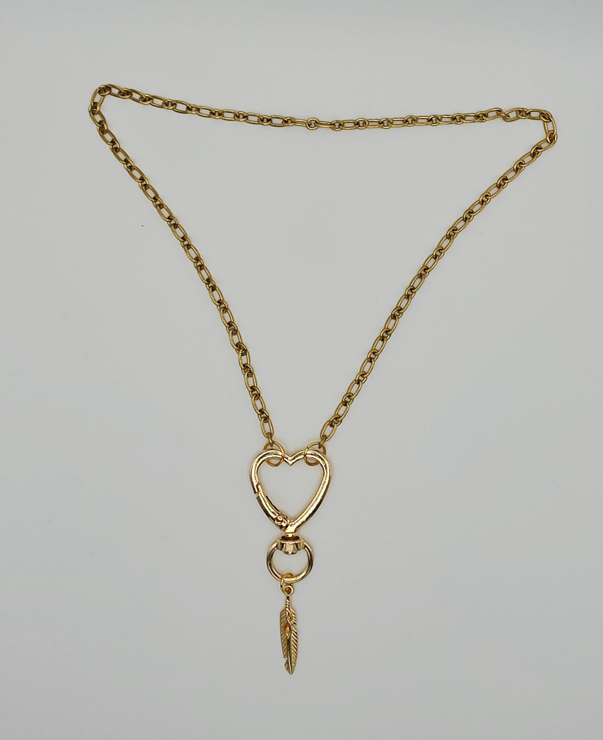 One-of-a-Kind Gold Tone Heart Clasp & Feather Charm Pendant Necklace (18") – Olivia Sparkles Fall 2026 Collection